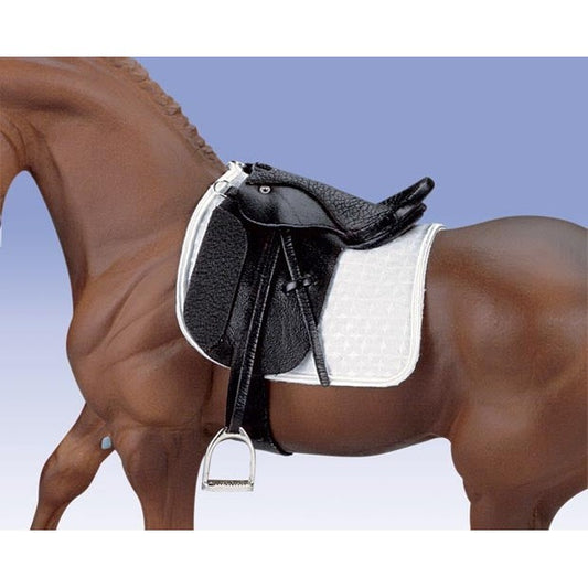 Close-up of Breyer Horse Toys model with detailed black saddle.
