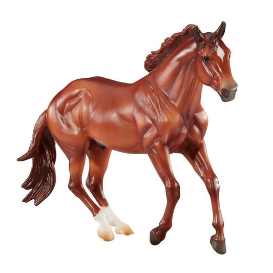 Breyer Horse Toy, chestnut model, white socks, flowing mane, isolated.