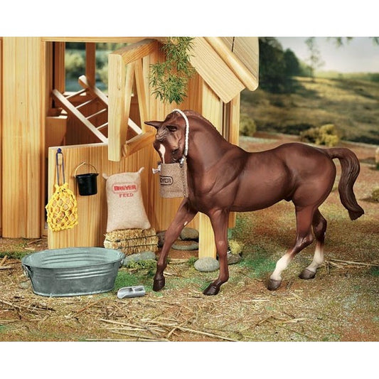 Breyer Horse Toy figure in stable setup with accessories.