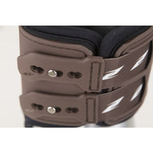 Close-up of Zandona horse boots showing adjustable straps and logo.