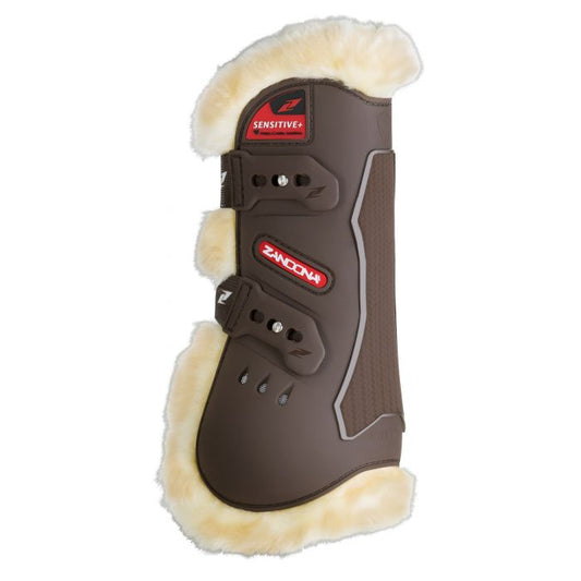Zandona horse boots, brown with fleece lining, isolated on white.