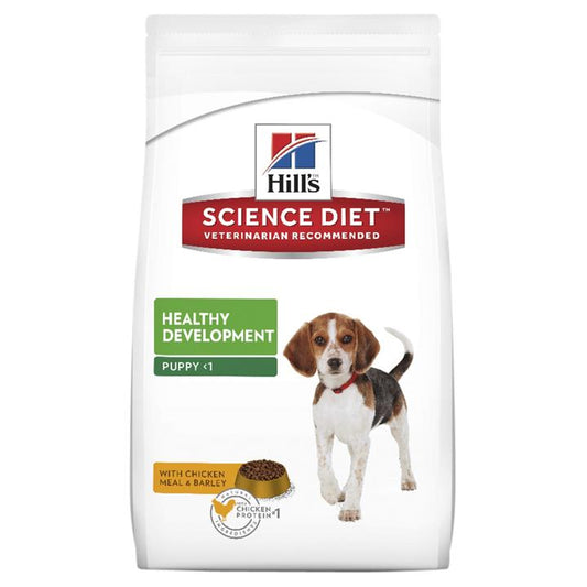 A bag of Hill's Science Diet Puppy Food for healthy development, with an image of a small beagle puppy and a kibble graphic, labeled "veterinarian recommended."