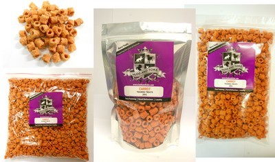 Several bags of orange horse treats with purple labels displayed.