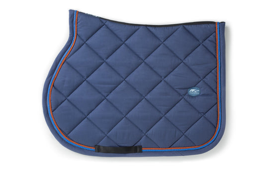 Anna Scarpati quilted navy horse saddle pad with orange trim.