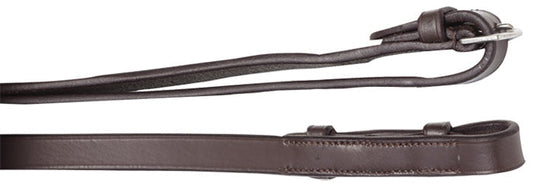 A pair of brown leather horse riding reins close up.