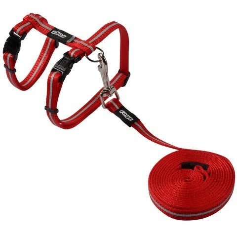 Red Rogz dog harness and leash set on white background.