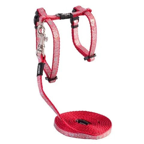 Alt text: Rogz red dog harness and leash set on white background.
