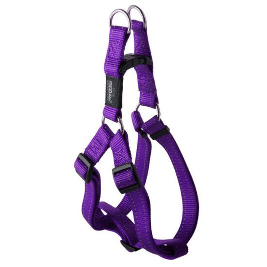 Purple Rogz dog harness isolated on white background.