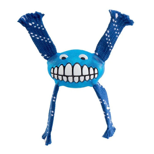 Alt: Rogz blue ball with smiling face and tassels.