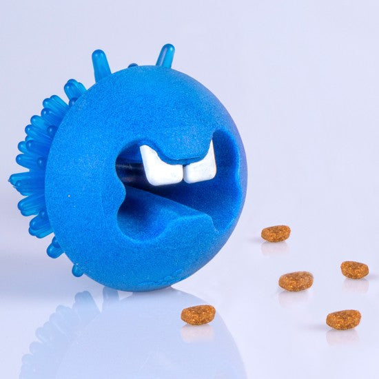 Blue Rogz dog toy with treats on white background.