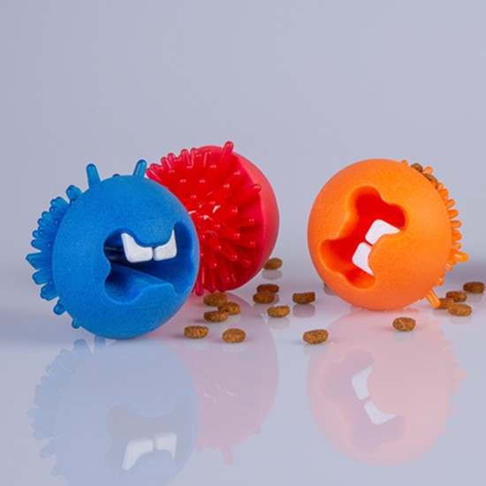 Rogz brand colorful spiky dog chew toys with treats.