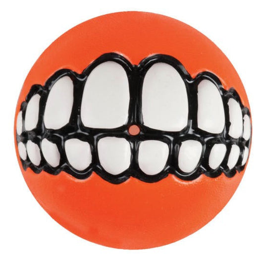 Rogz orange ball with a black and white teeth design.