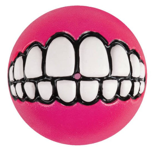 Rogz pink ball with quirky smiley teeth design.