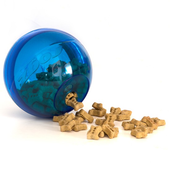 Blue Rogz treat ball with dog biscuits spilled out.