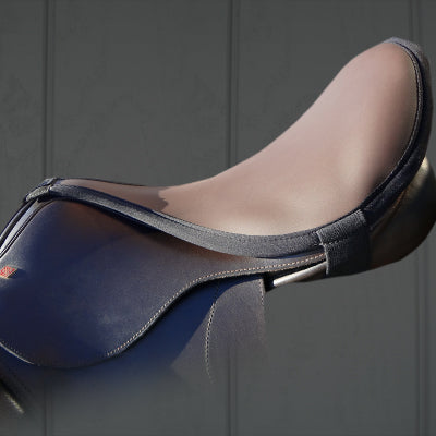 Thinline saddle with contoured seat for horse riding comfort.