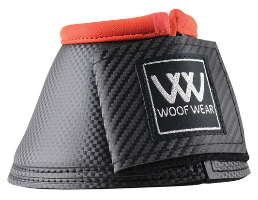 Woof Wear brand black carbon-effect horse boot with orange trim.