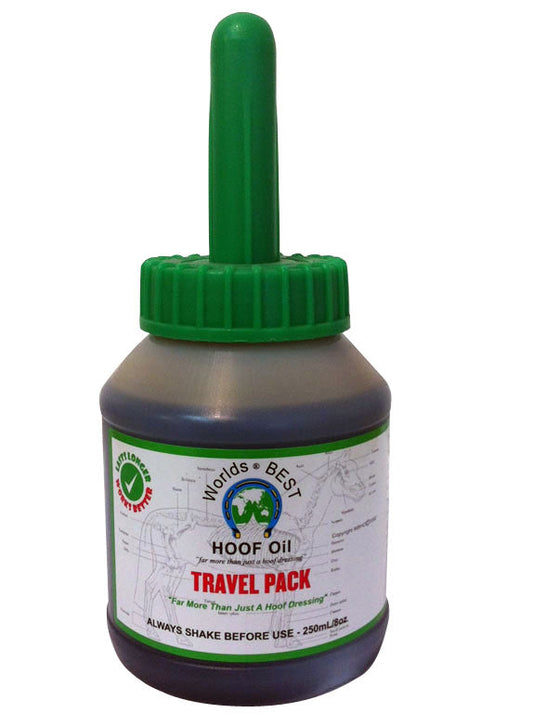 A bottle labeled "World's Best Hoof Oil, TRAVEL PACK" with a green cap and applicator, designed for equine hoof care.