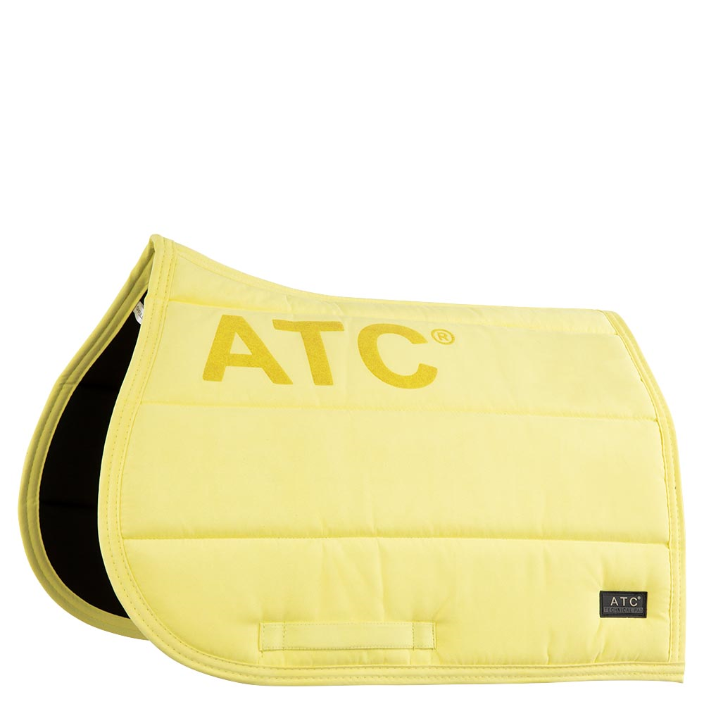 Yellow ANKY saddle pad with quilted design and logo detail.