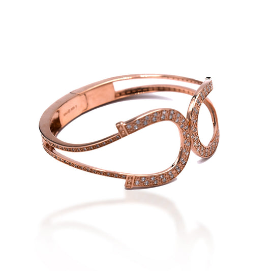 Kelly Herd brand rose gold encrusted horse bit bracelet.