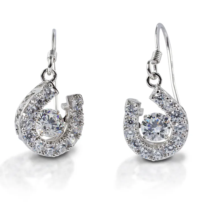 Kelly Herd silver horseshoe earrings with sparkling cubic zirconia stones.