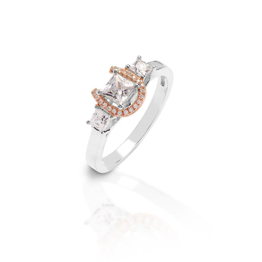 Kelly Herd silver ring with diamonds and rose gold accents.