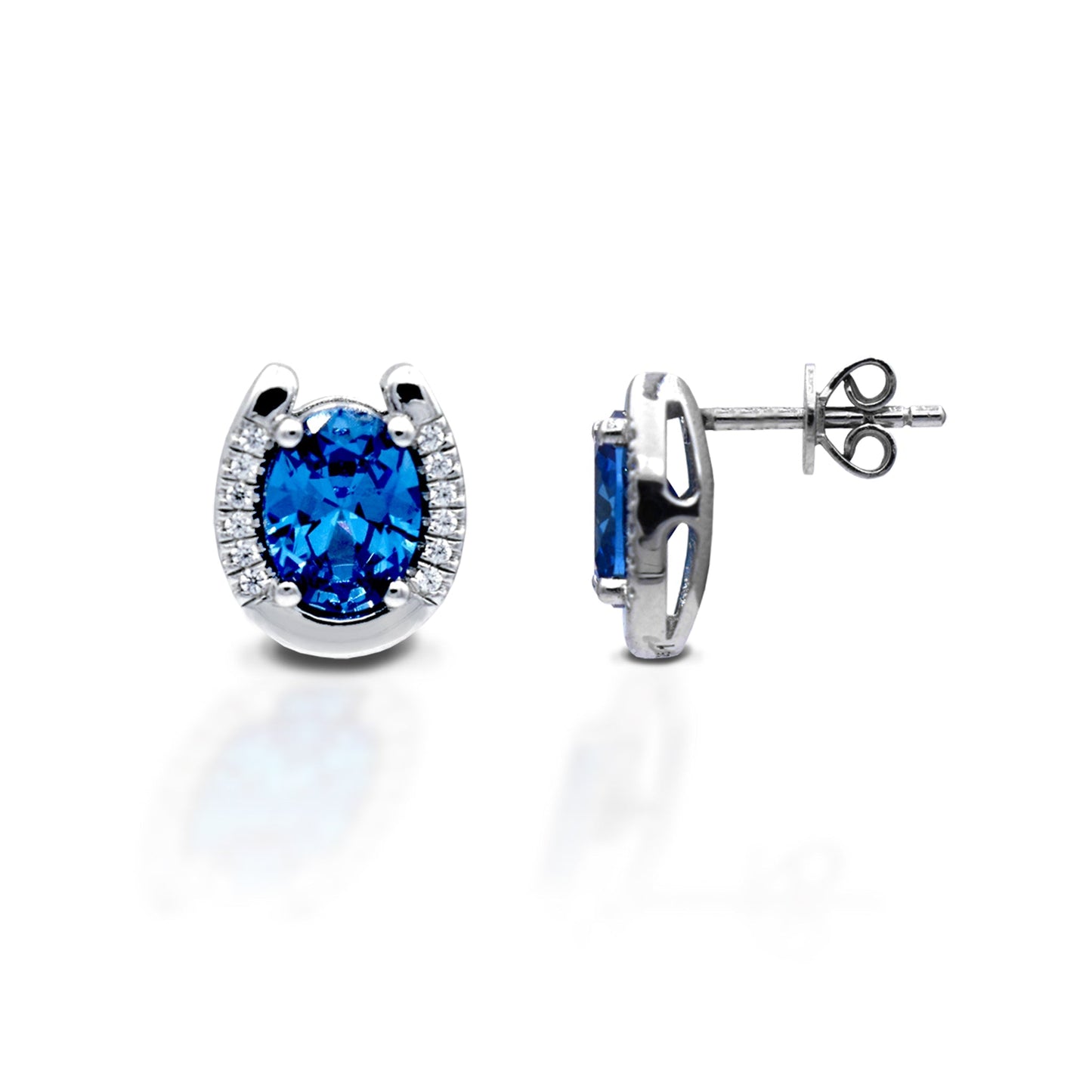 Kelly Herd blue gemstone earrings with diamond halo on white.