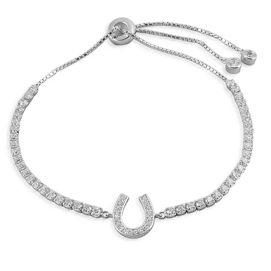 Kelly Herd silver bracelet with horseshoe charm and adjustable chain.