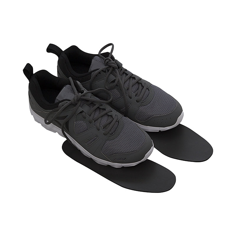 Gray Thinline sneakers with black insoles displayed alongside them.