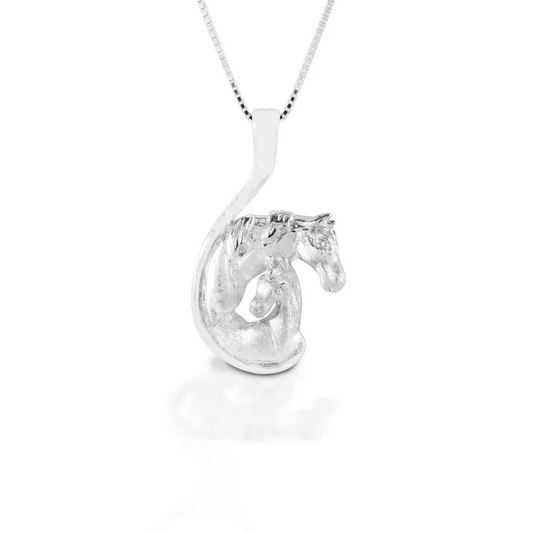 Alt text: Kelly Herd silver horsehead pendant on a chain necklace.